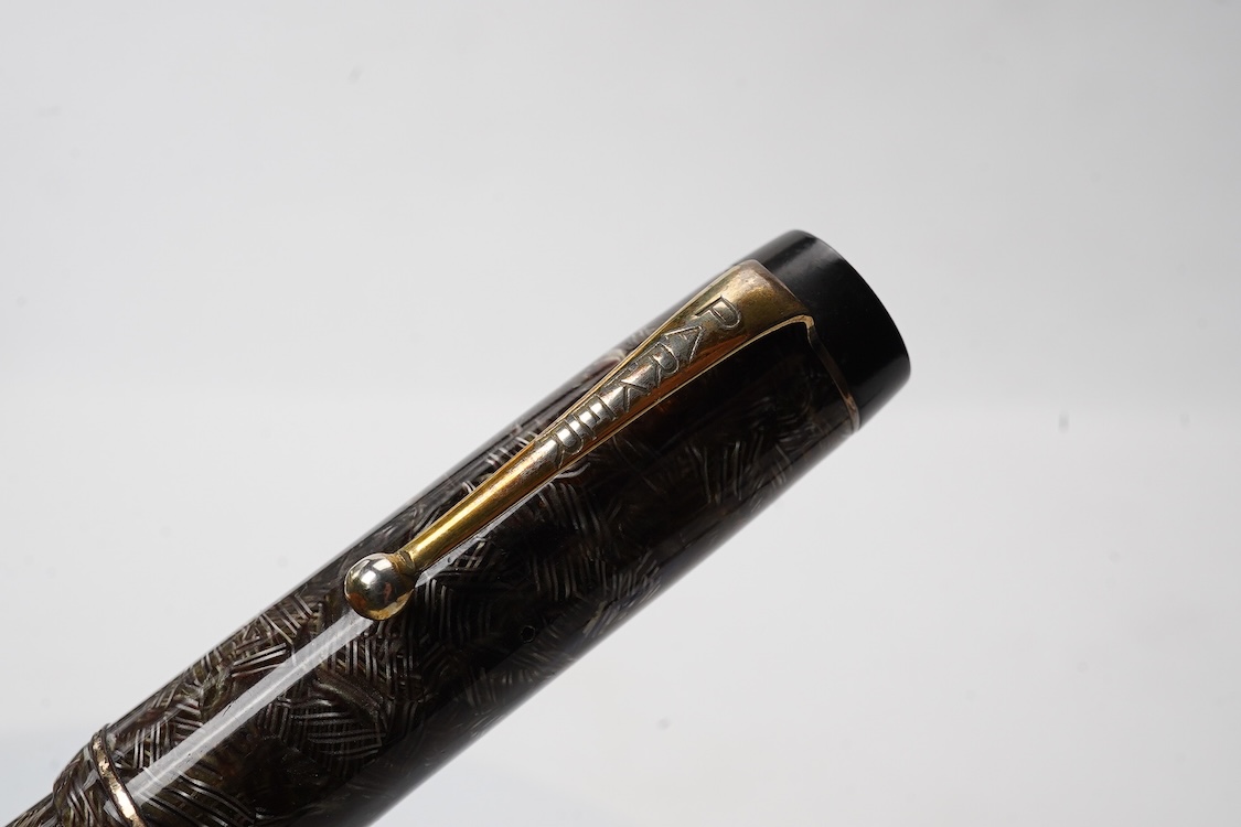 A Parker Senior UK Duofold 'brown candy stripe' fountain pen with 14ct. gold 'N' nib